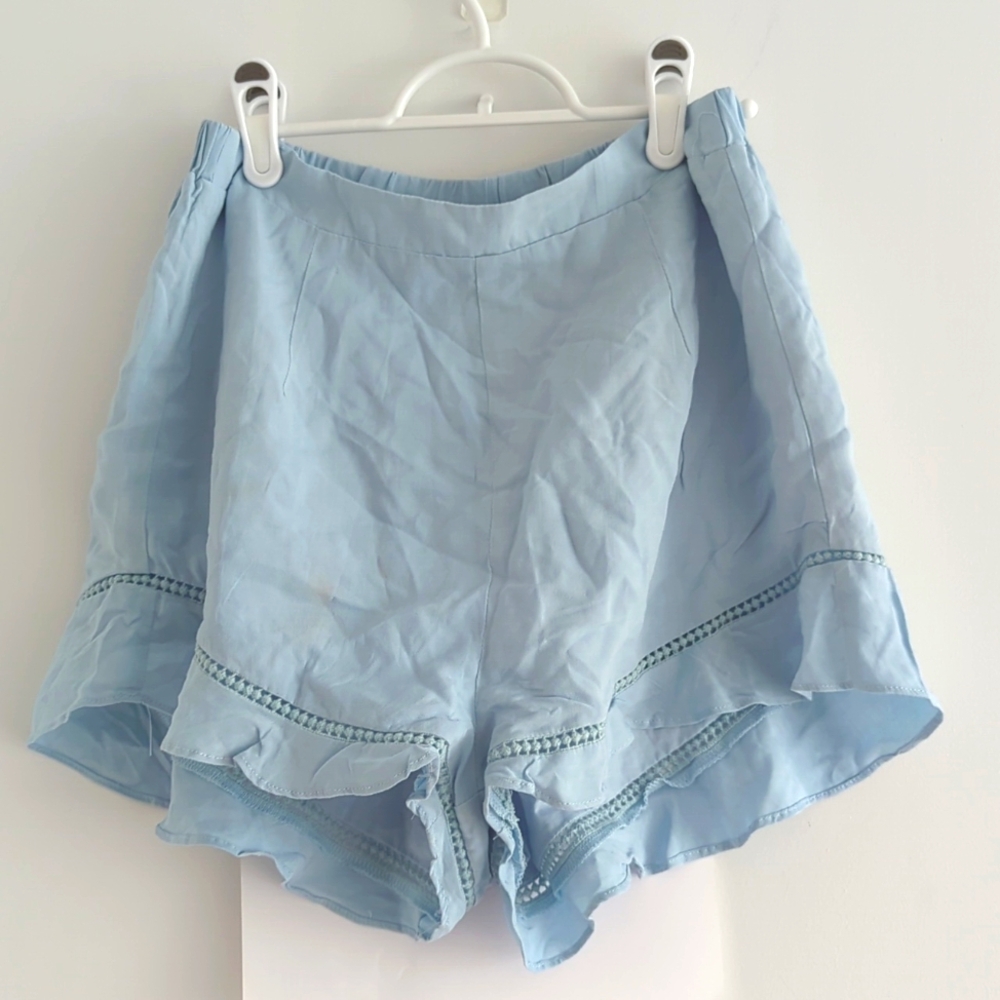 Blue high waisted flutter hem shorts